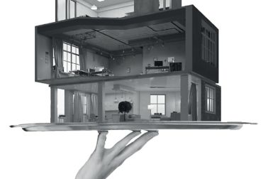 Illustration of modular building home on tray held by hand