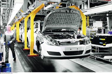 Car being produced in a car factory production line