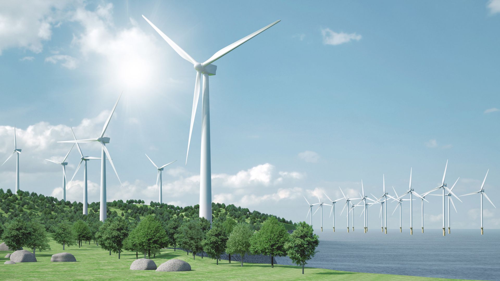 Wind energy farm with onshore and offshore turbines