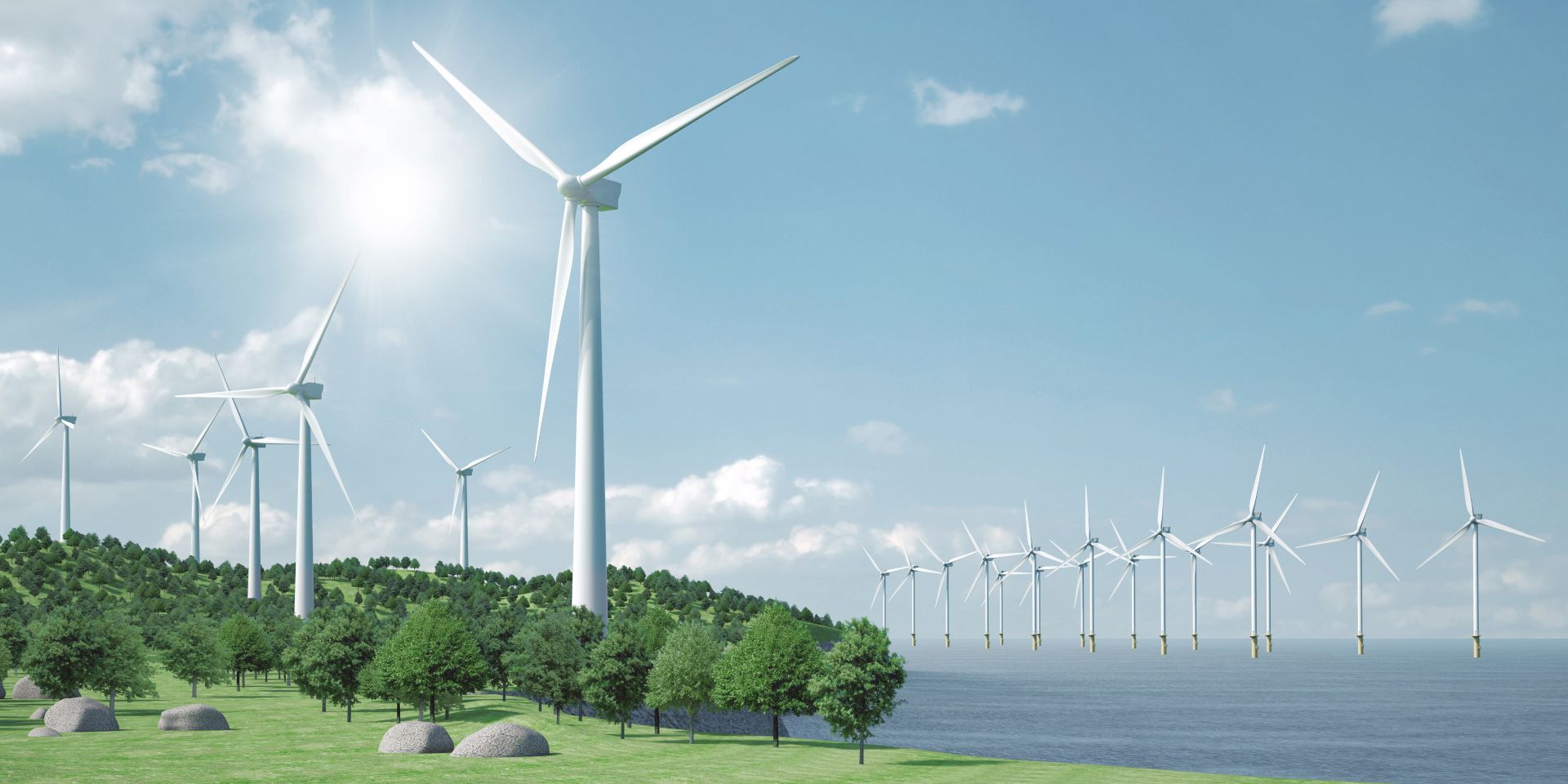 Wind energy farm with onshore and offshore turbines