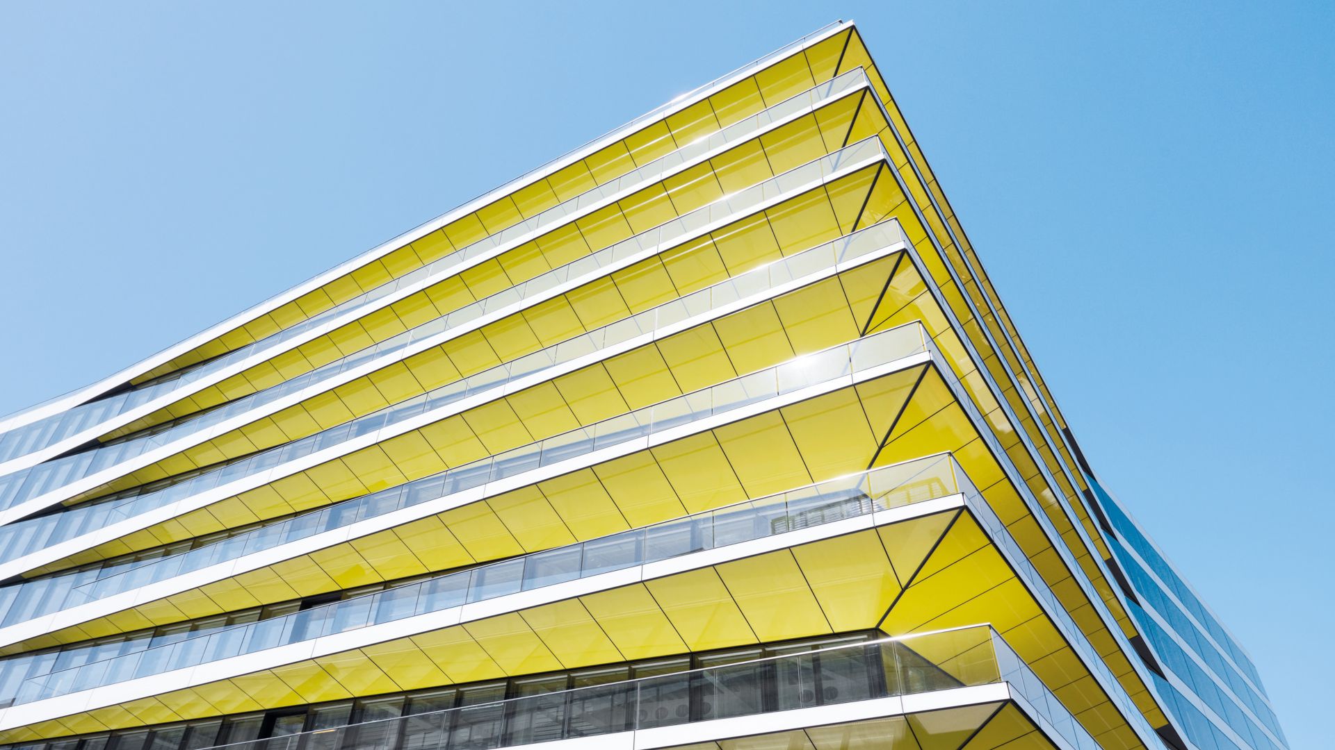 Modern commercial building with yellow panel parts