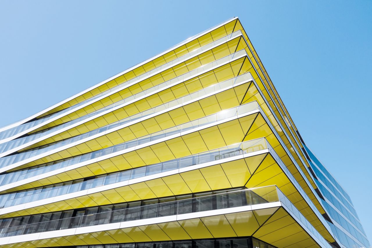 Modern commercial building with yellow panel parts