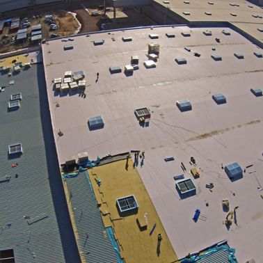 Applying Sika Sarnafil waterproofing membrane on all roofing areas on Volkswagen Plant in Wrzesnia