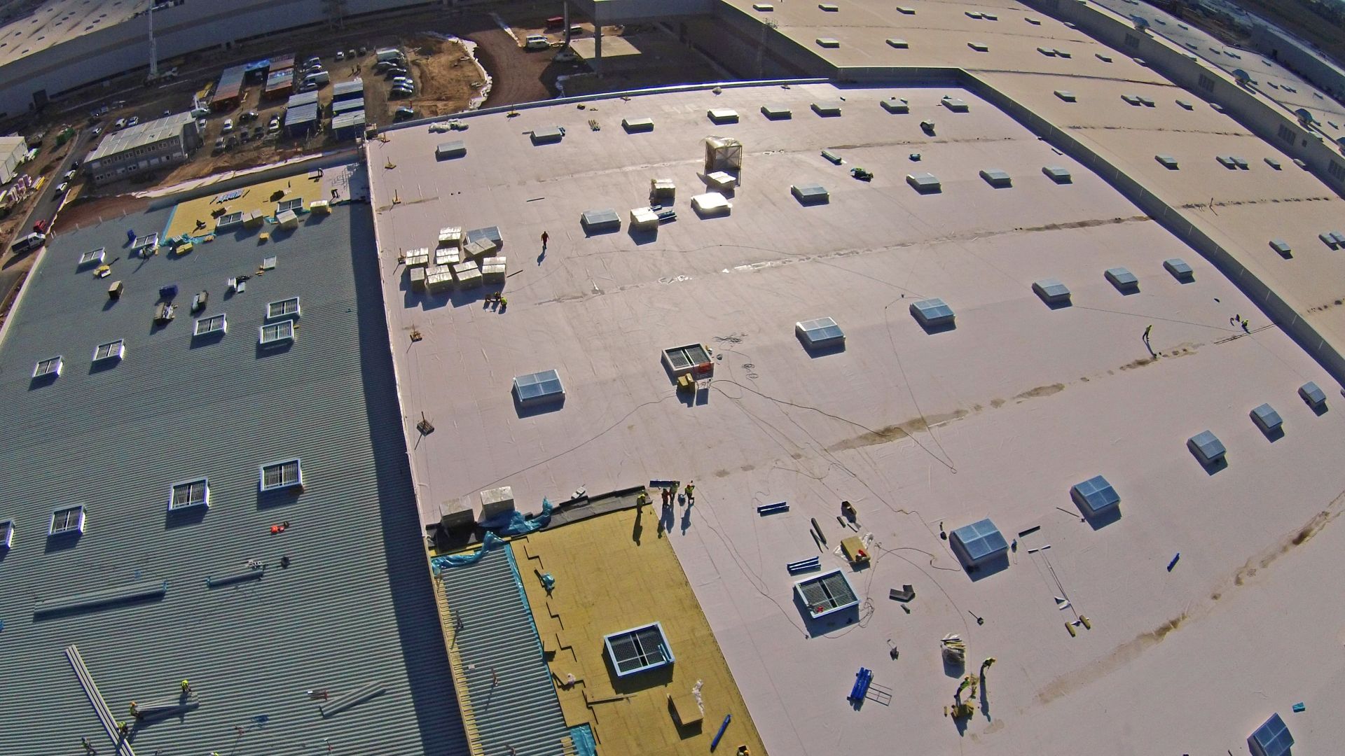 Applying Sika Sarnafil waterproofing membrane on all roofing areas on Volkswagen Plant in Wrzesnia