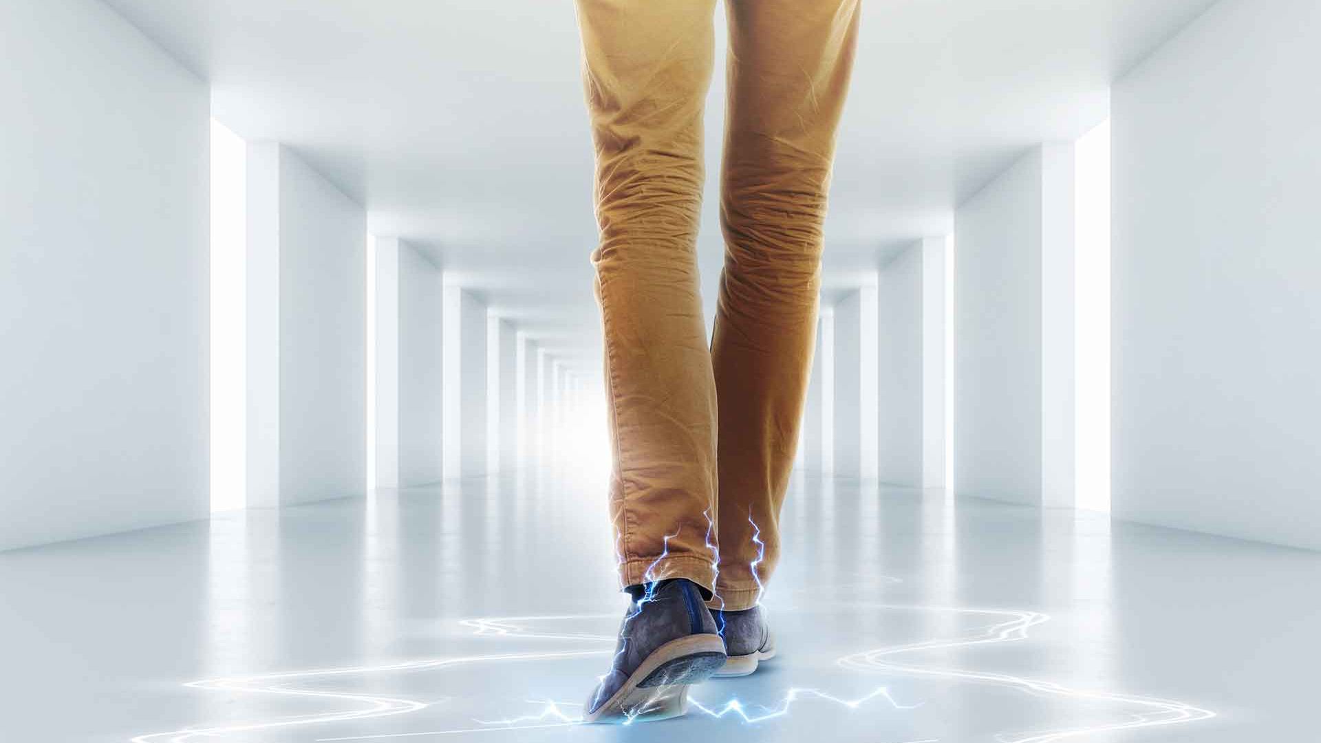 Shoes walking on white conductive floor