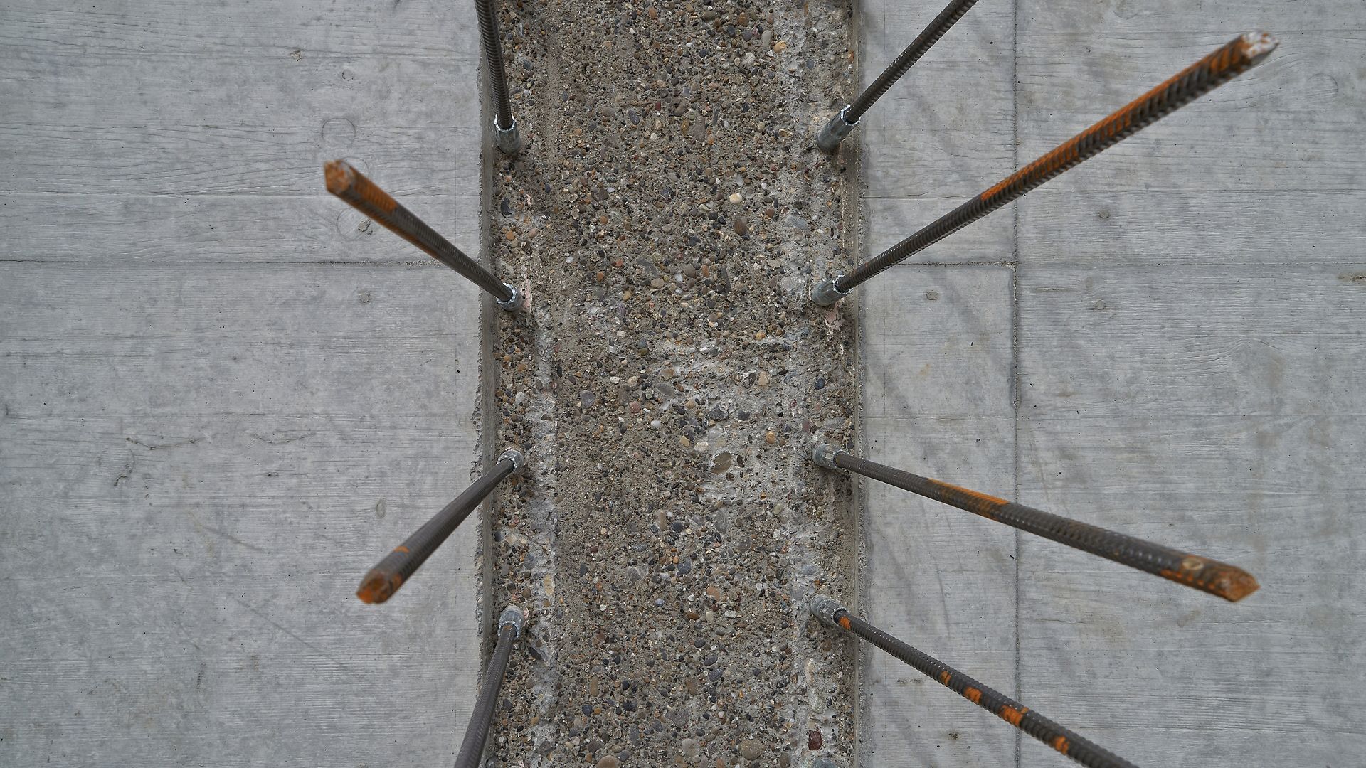 Sika® Rugasol® surface retarder applied to concrete for exposed aggregate reinforcement on construction site