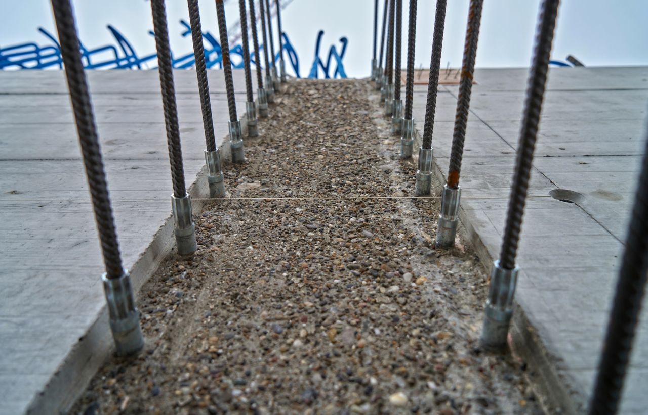 Sika® Rugasol® surface retarder applied to concrete for exposed aggregate reinforcement on construction site