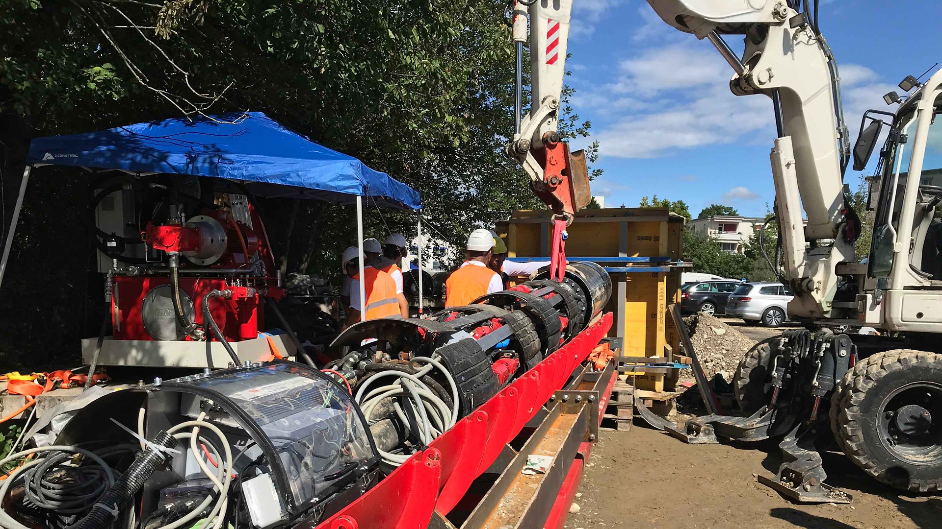 Swissloop Tunneling team working outside with TBM