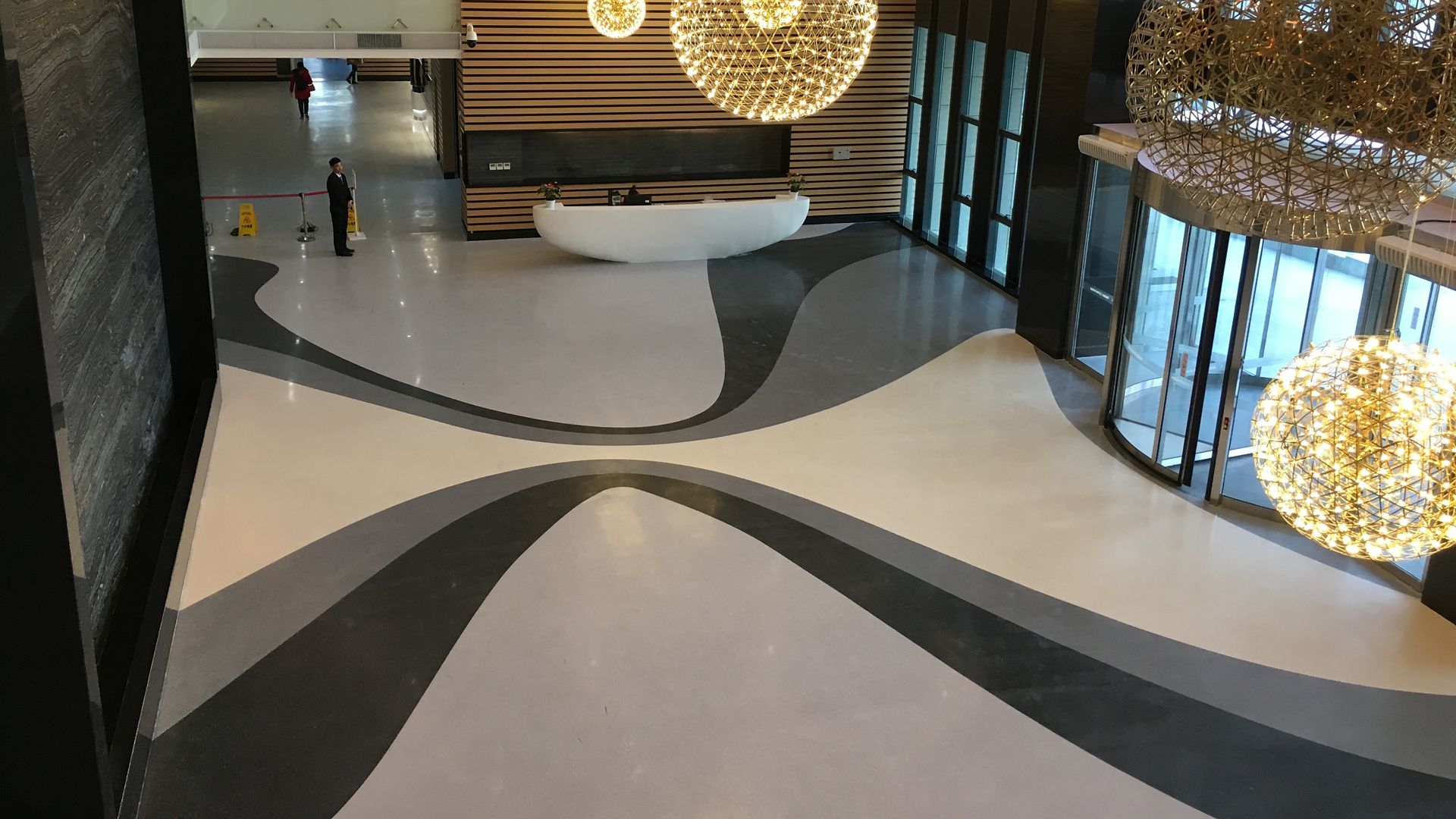 Sikafloor® Terrazzo white grey black floor in public building lobby entry