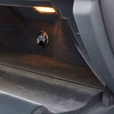 Interior view of vehicle glove box using SikaTherm flocking adhesives solution