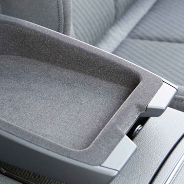 View of vehicle center console storage using Sika interior flocking adhesive solutions