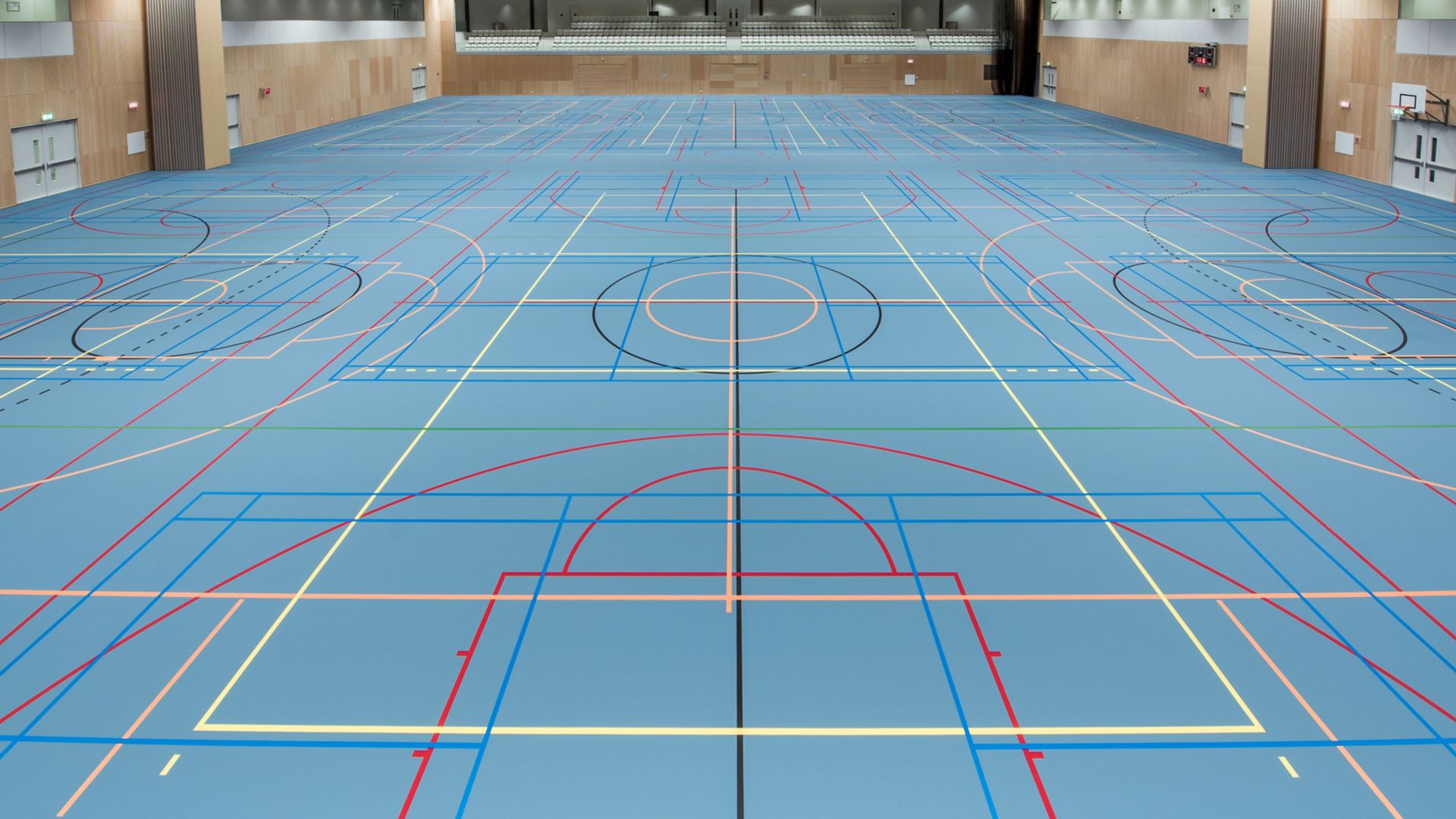 Basketball court gym blue floor with Sika Pulastic flooring at Zuiderpark Sport Center in the Netherlands