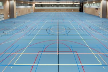 Basketball court gym blue floor with Sika Pulastic flooring at Zuiderpark Sport Center in the Netherlands