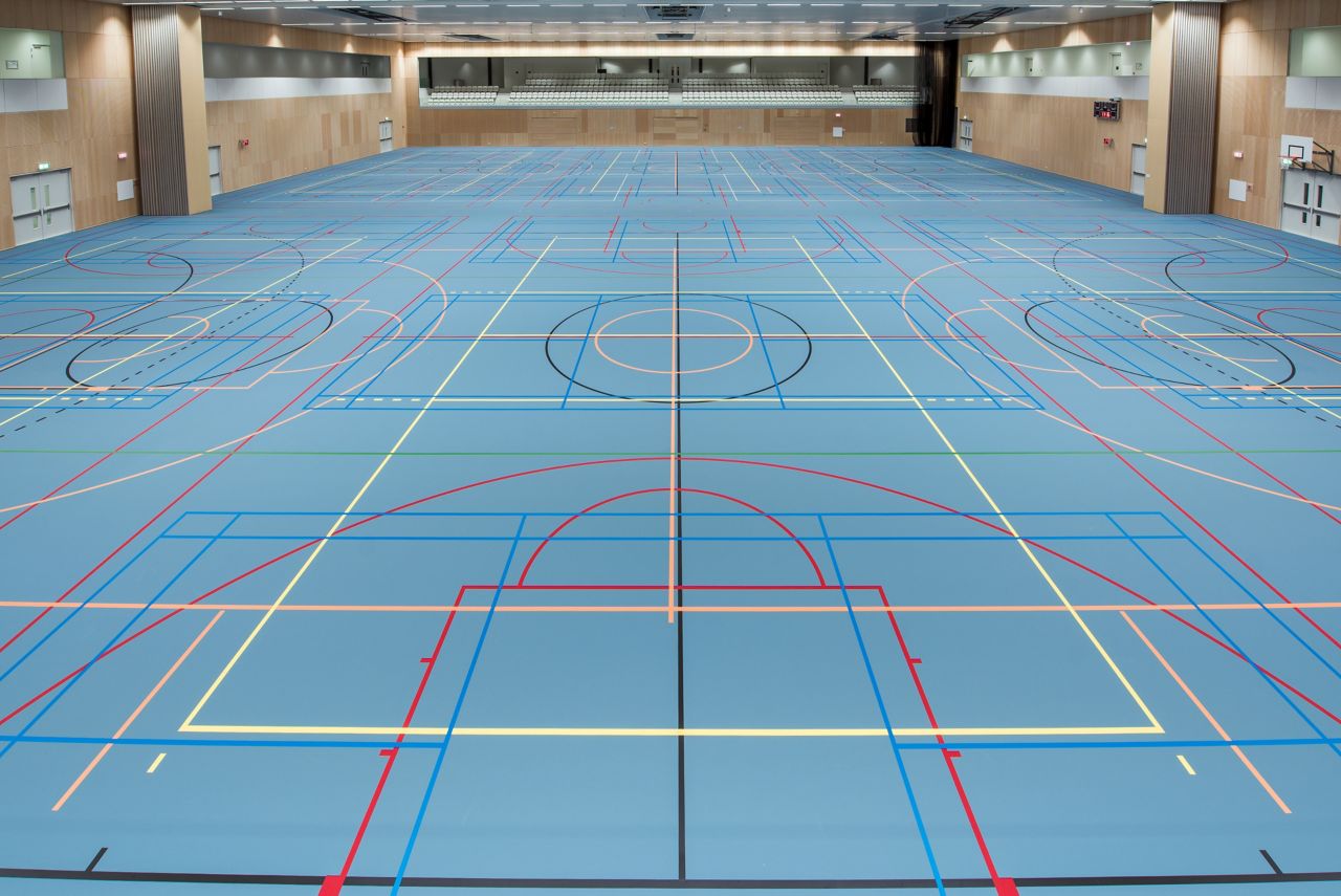 Basketball court gym blue floor with Sika Pulastic flooring at Zuiderpark Sport Center in the Netherlands