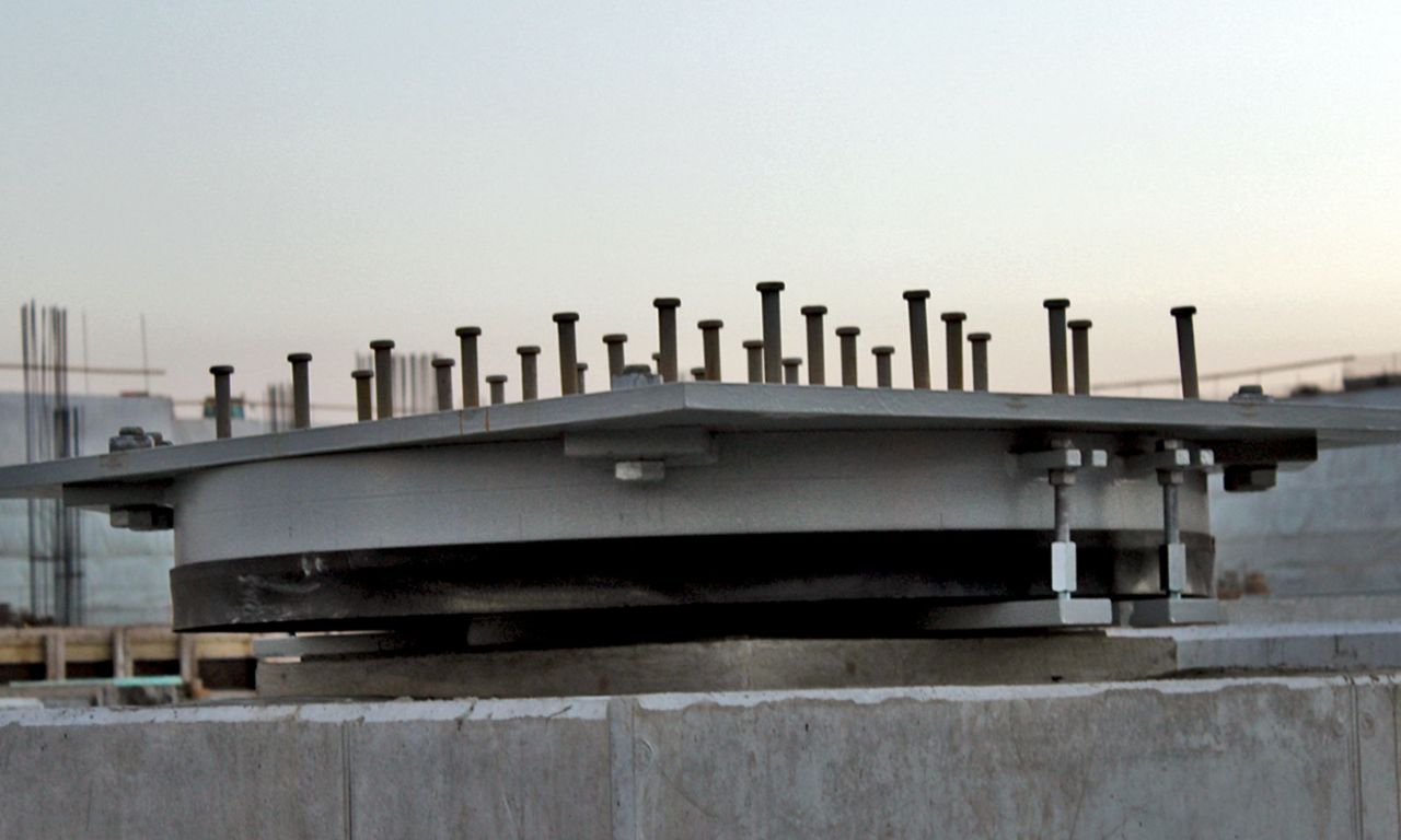 Seismic isolation system with cementitious grout for the Stavros Niarchos Foundation Cultural Center