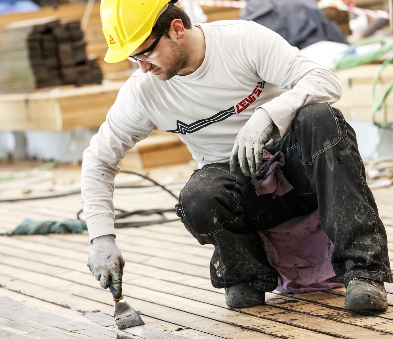 Teak deck application on the deck of a ship