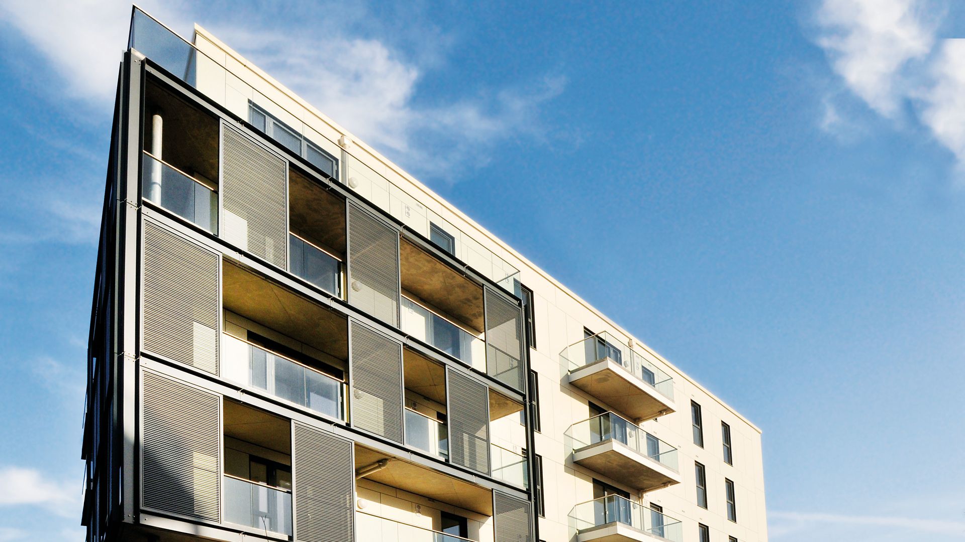 Apartment house with glass panels