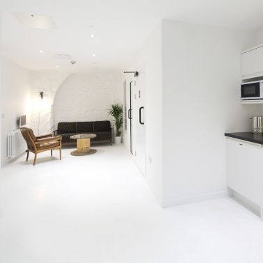 Sika ComfortFloor® white floor in completely white interior of home kitchen