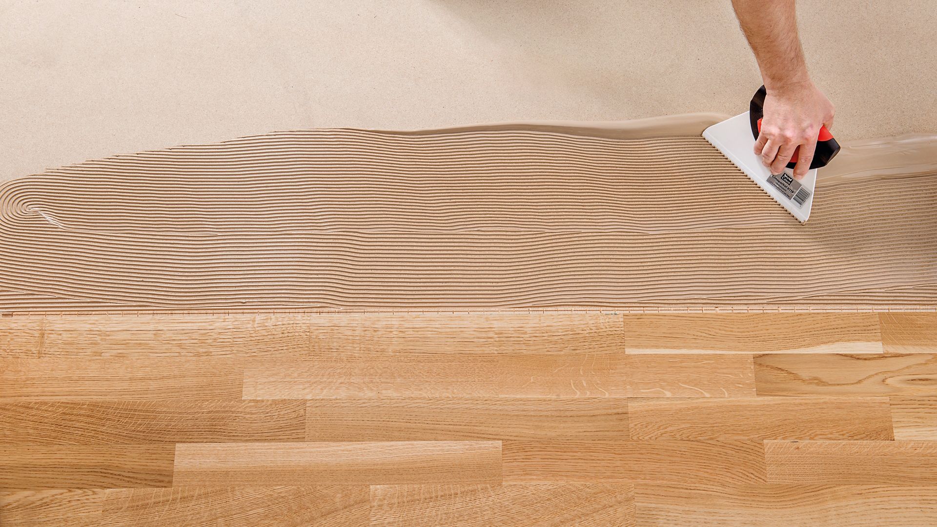 Wood floor bonding with SikaBond adhesive