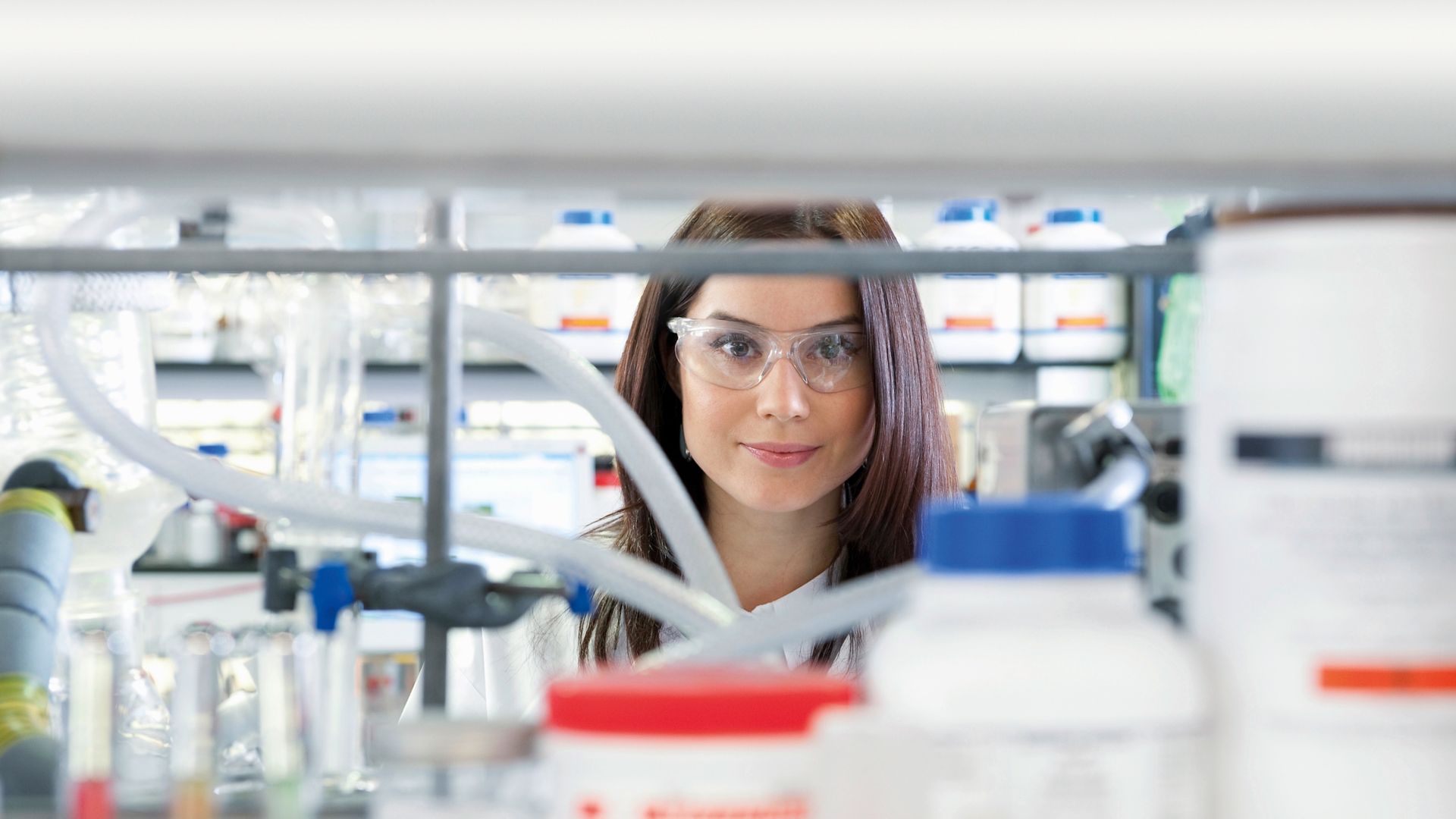 Laboratory scientist looking at camera --- Image by © David Burton/cultura/Corbis