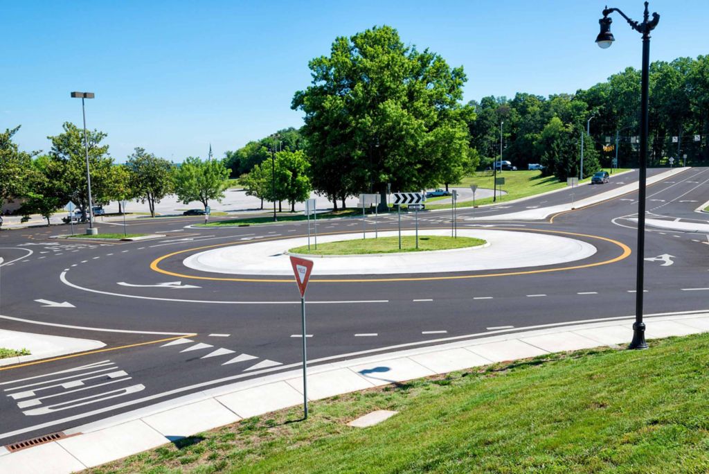 Road roundabout with trees and grass