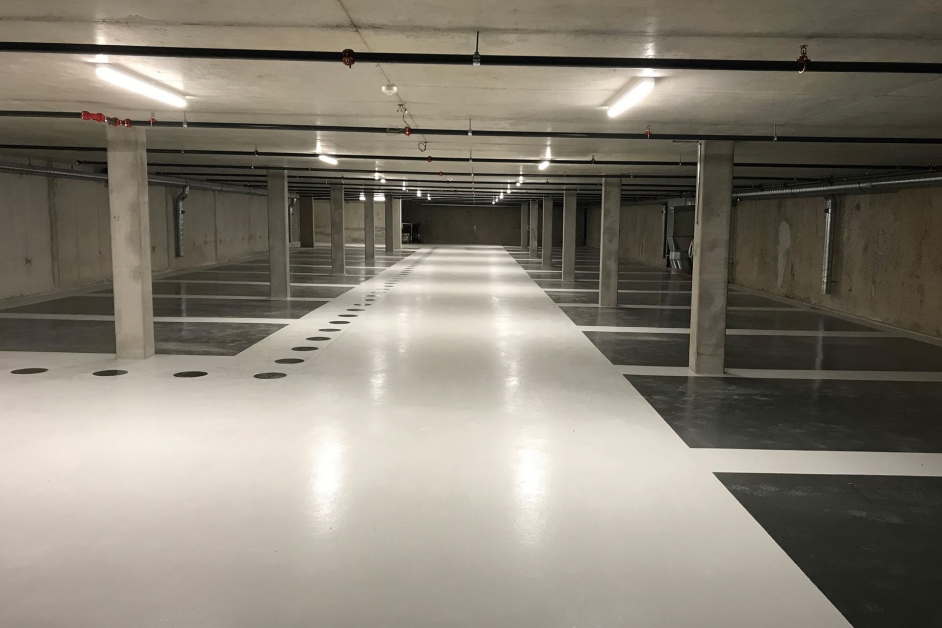 Revêtement de sol sans joint pour parking souterrain, Collonge-Bellerive