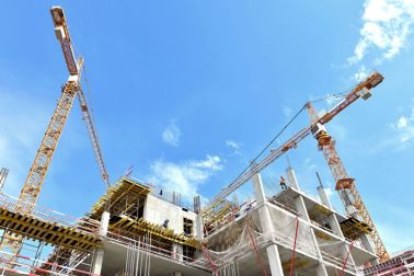 A new building is being constructed with use of tower crane