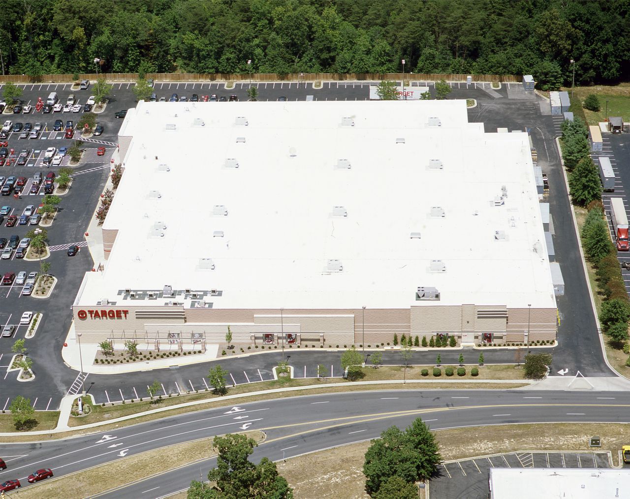 Energy efficient white Sarnafil roofing membrane on a Target shopping center 