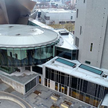 Aerial view of the Denver Art Museum showing the front of building with a Sarnafil white roof membrane on the top.