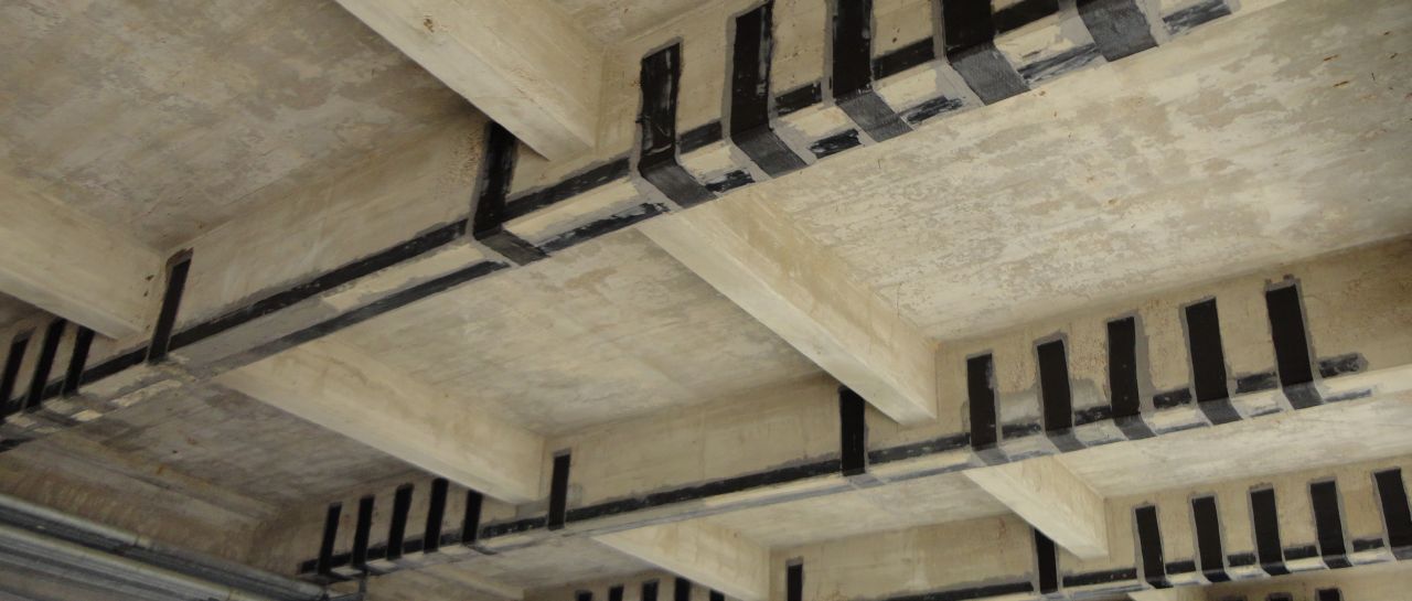 Showing underneath of bridge with structural strengthening