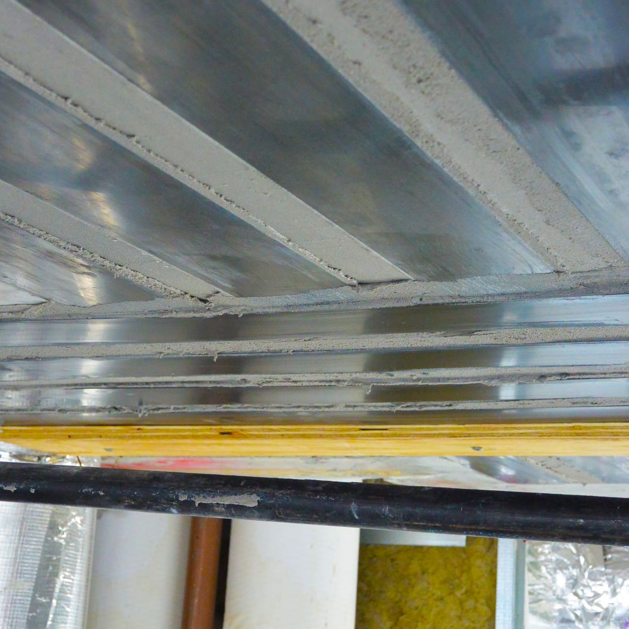 structural strengthening strips on ceiling