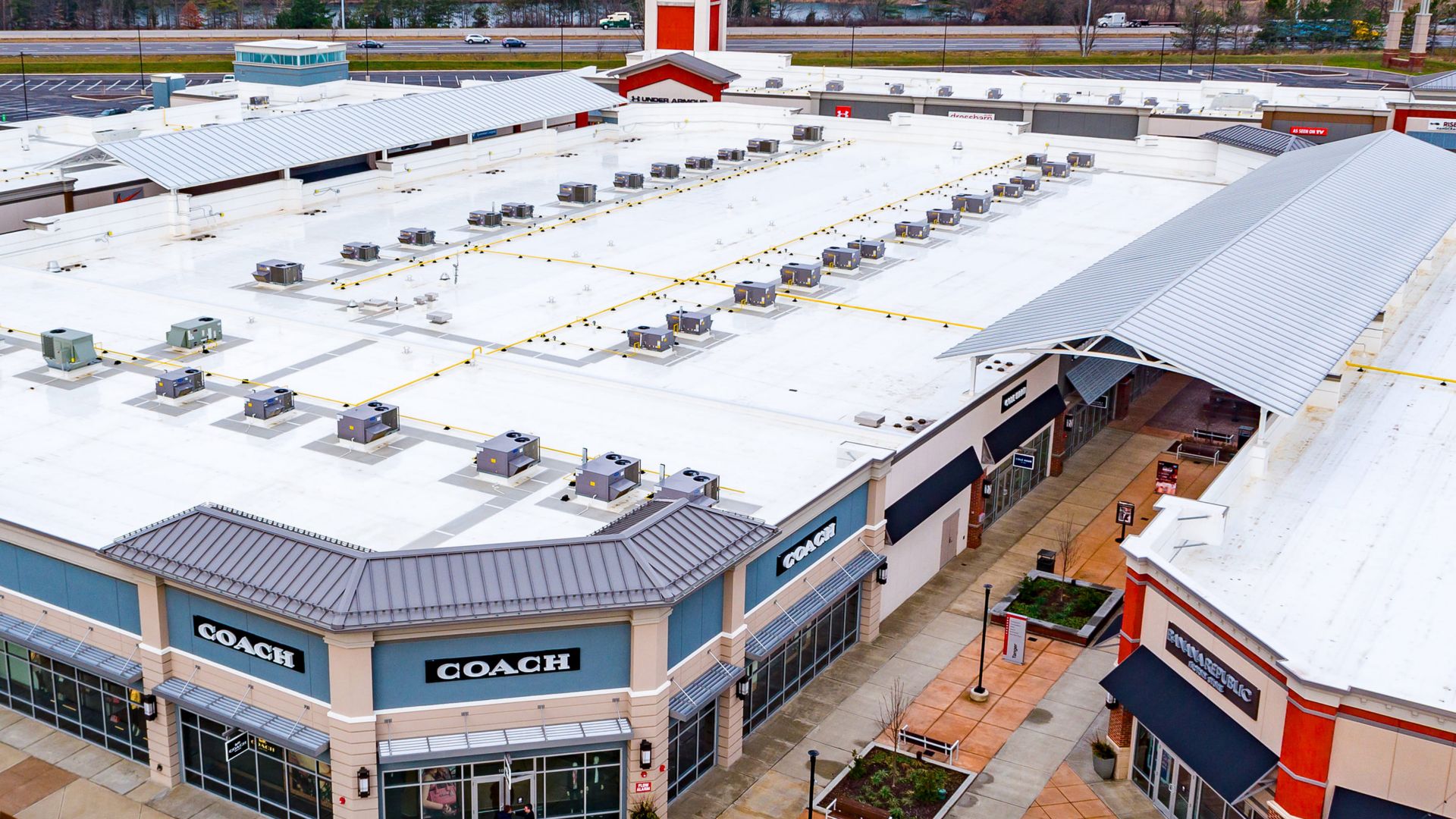 White Sarnafil membrane roof on the top of the Tanger Outlets in Sunburg Ohio