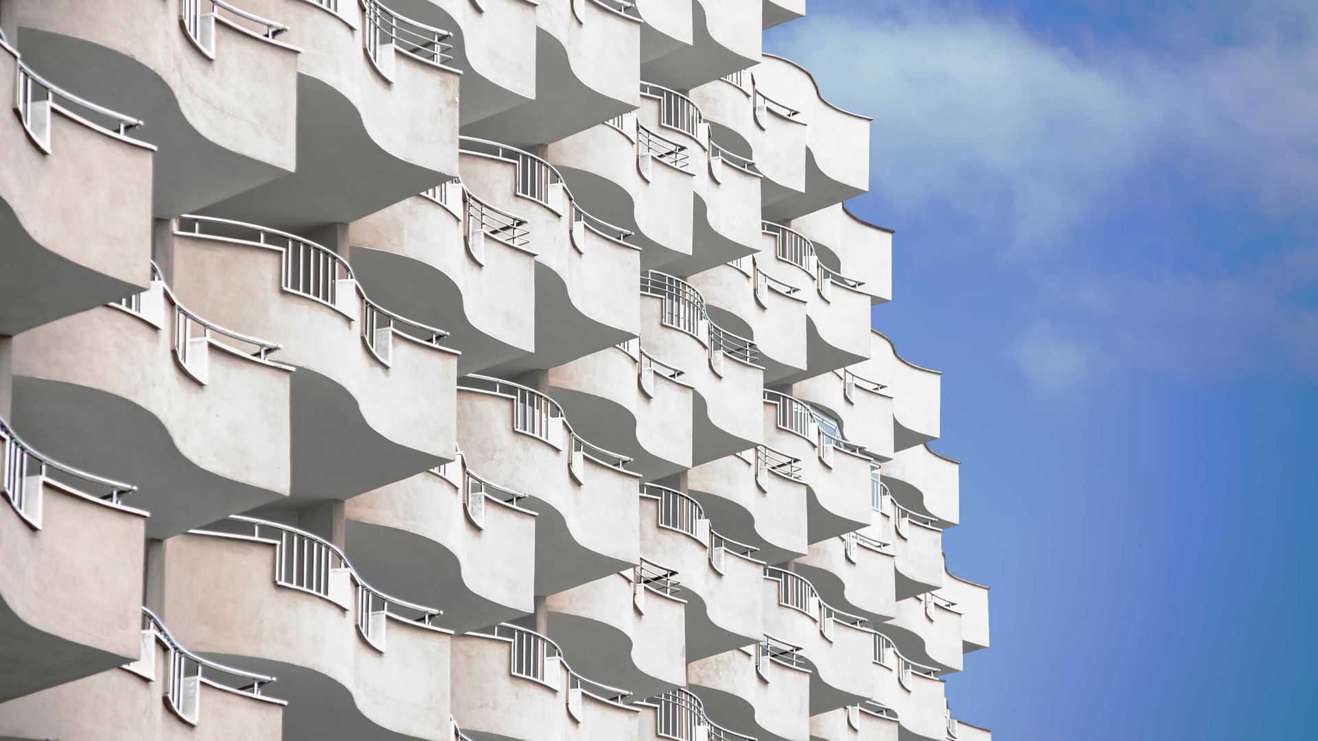 Upwards view of wave shaped balconies