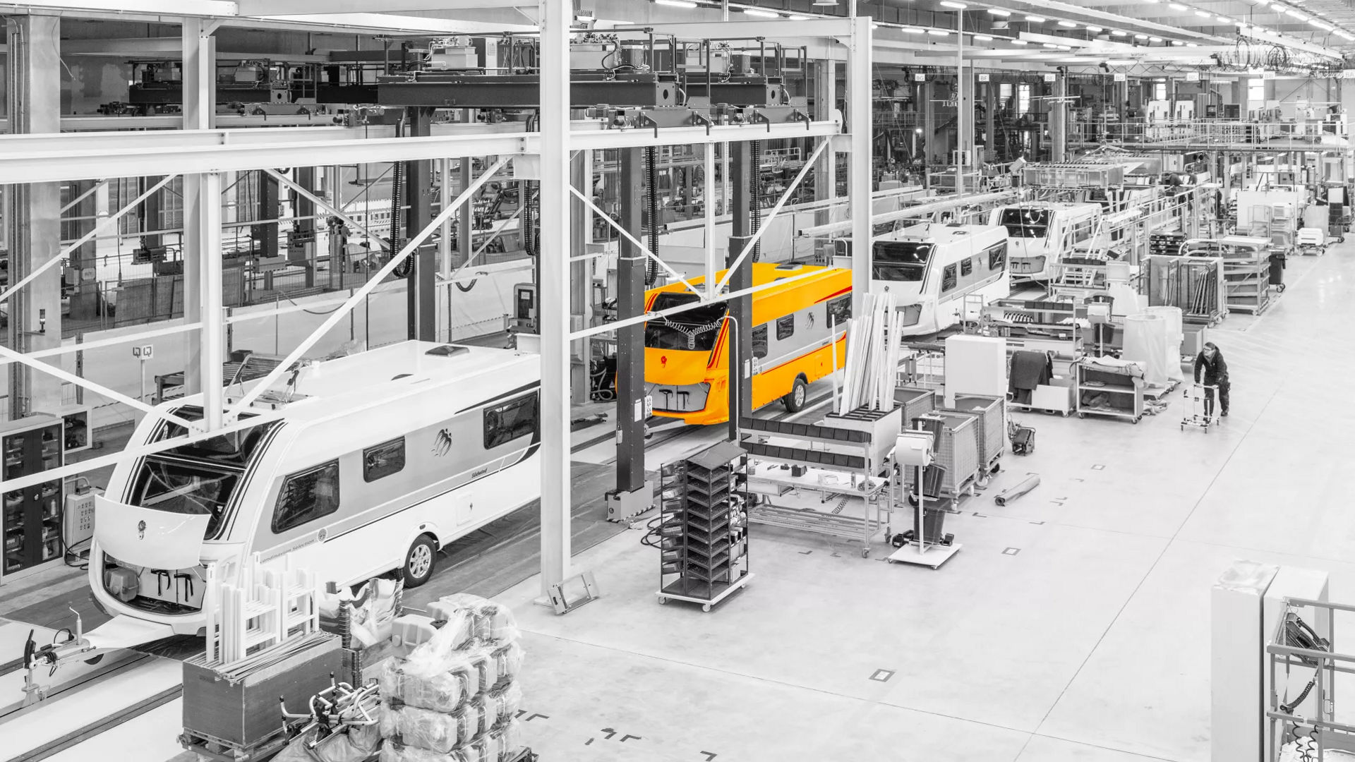 Modern factory with vehicles in production