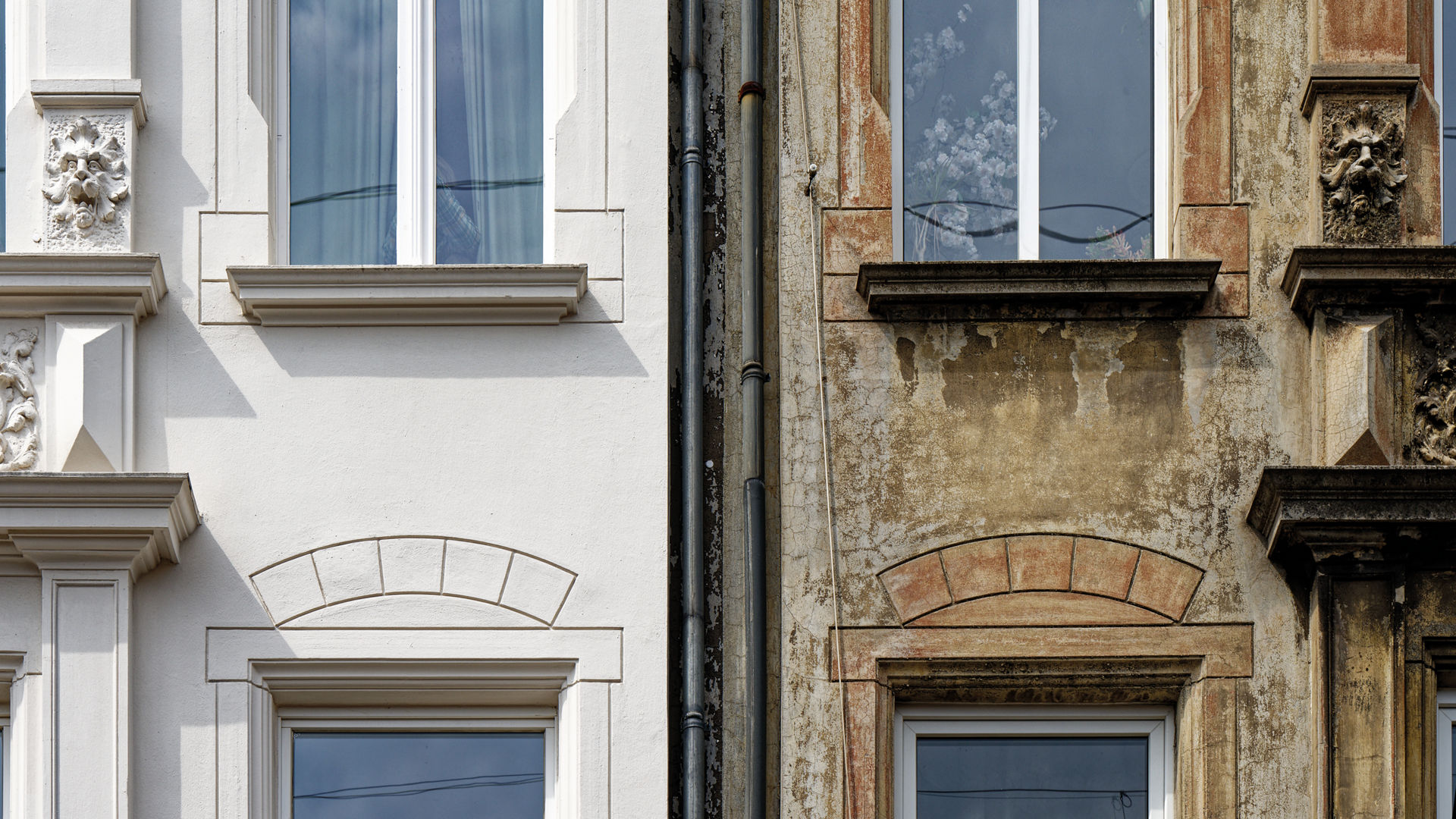 Contrast of Renovated and Weathered Building Facades