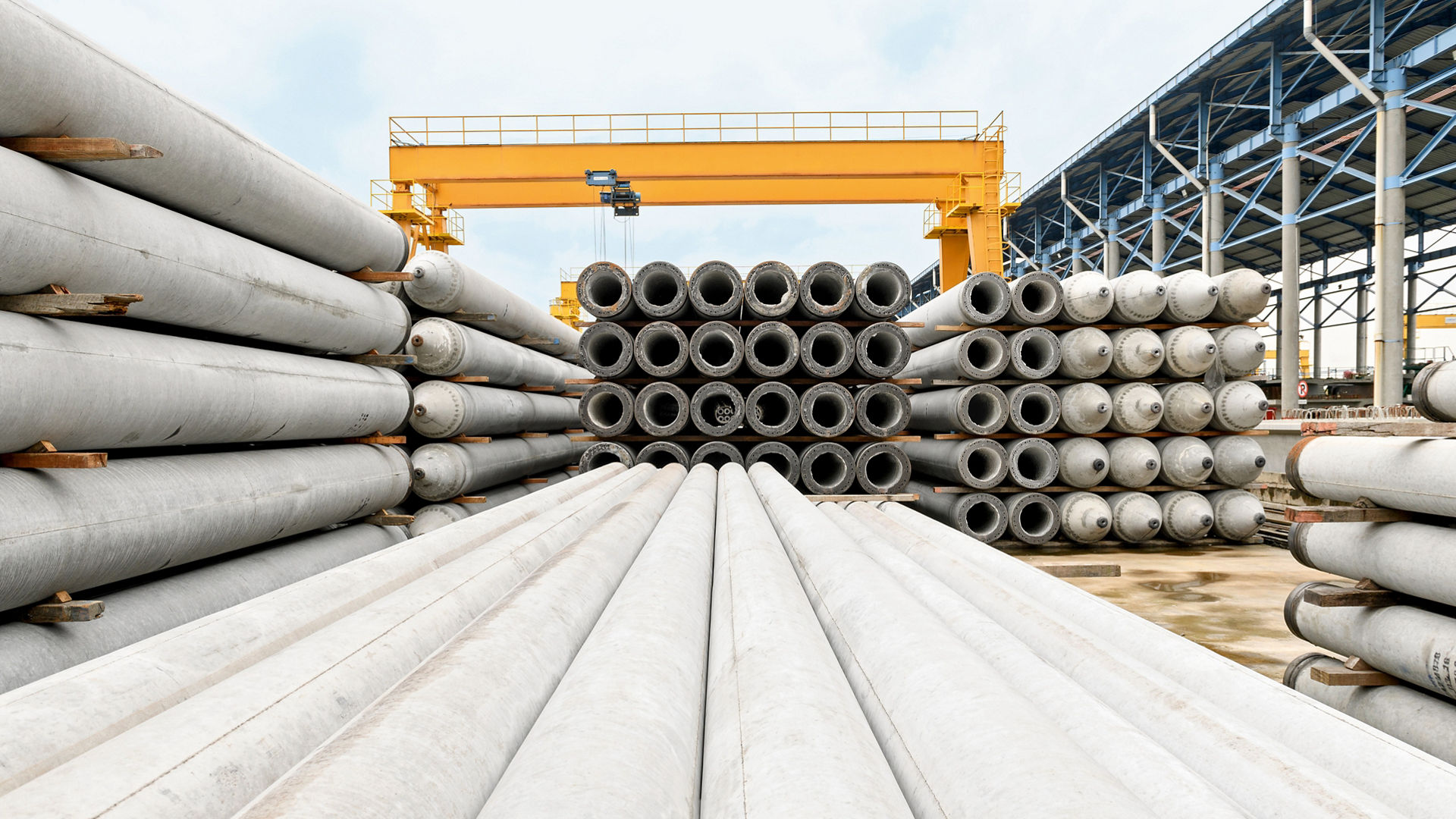 Precast concrete tubes stacked in piles