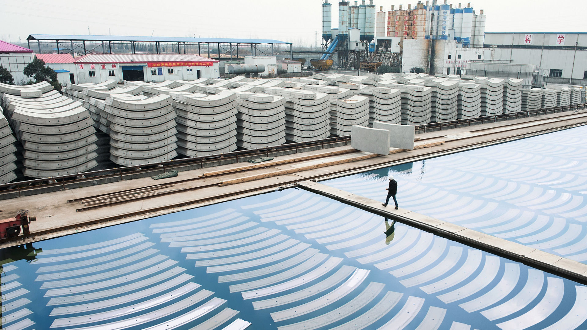 precast concrete plant with stacks of concrete