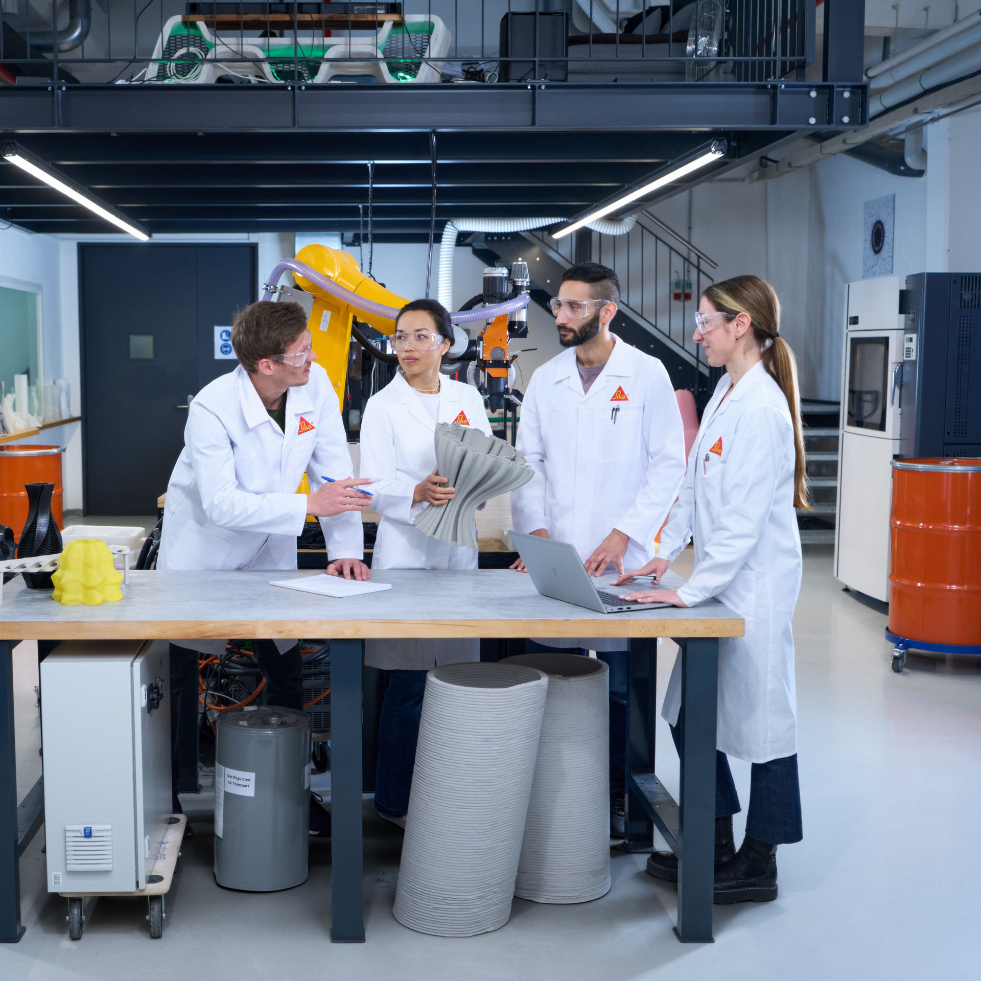 Engineers Collaborate in Modern Robotics Laboratory