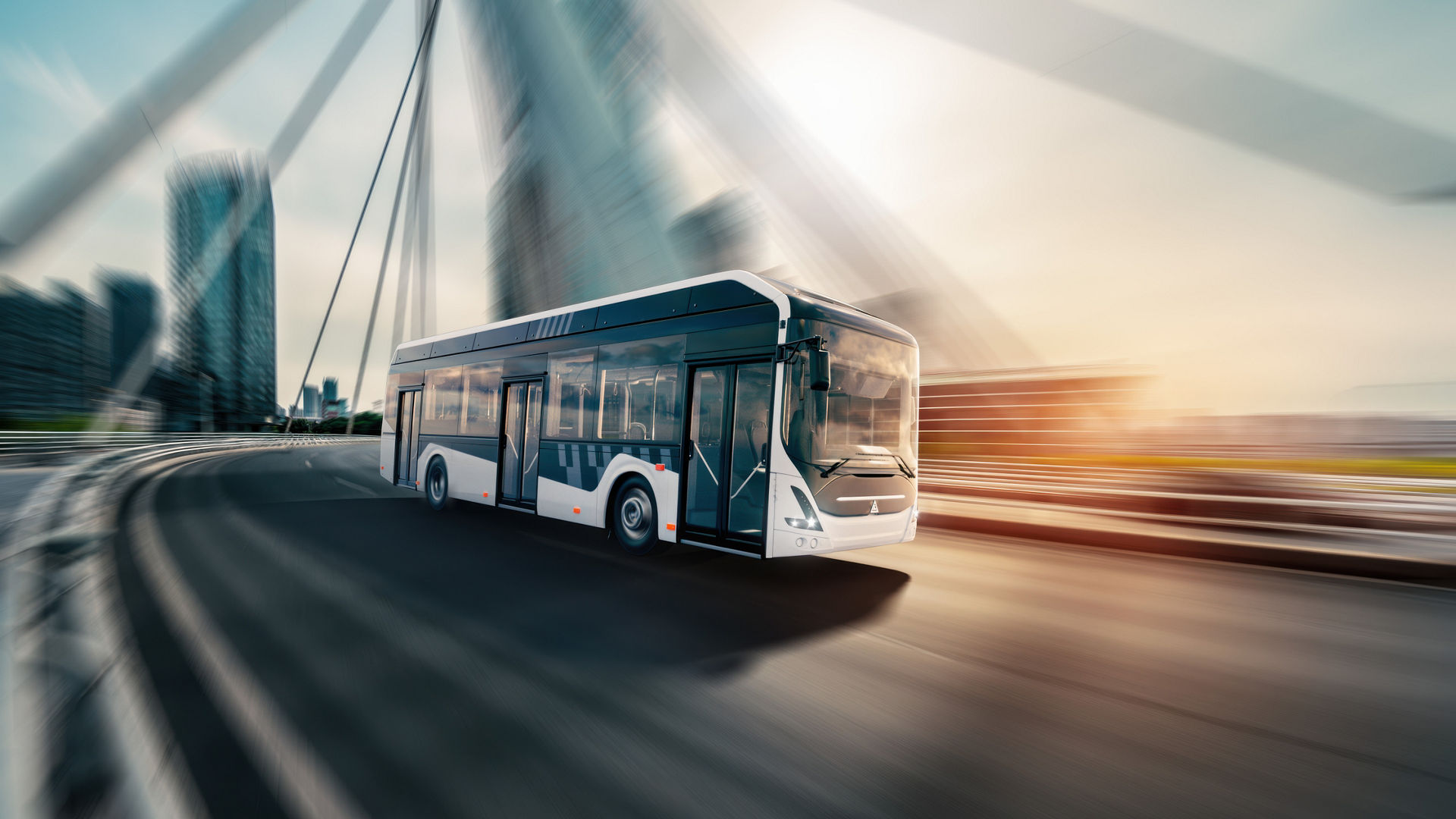 Modern city bus crossing urban bridge