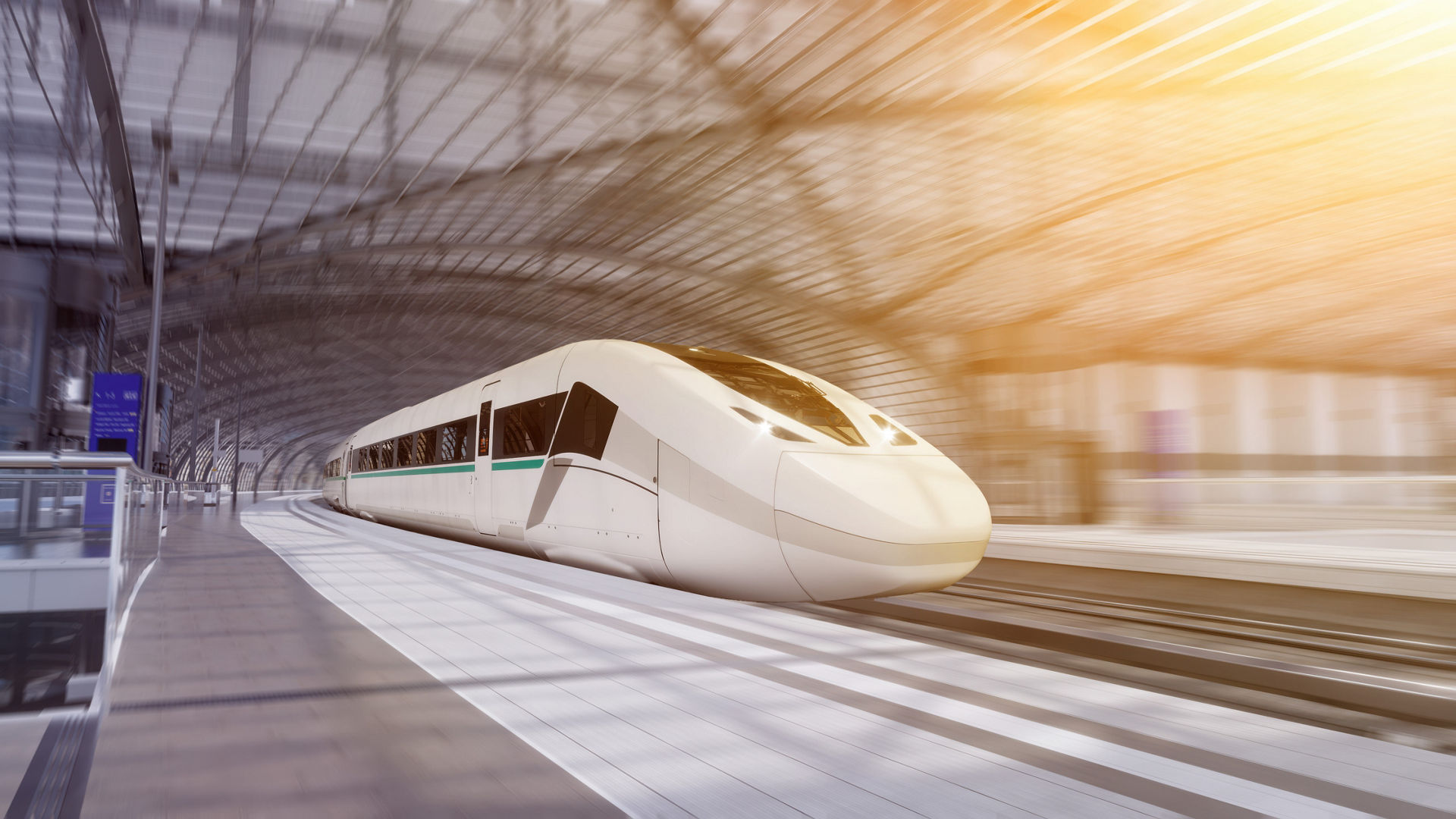 Modern high-speed train in sunlit station