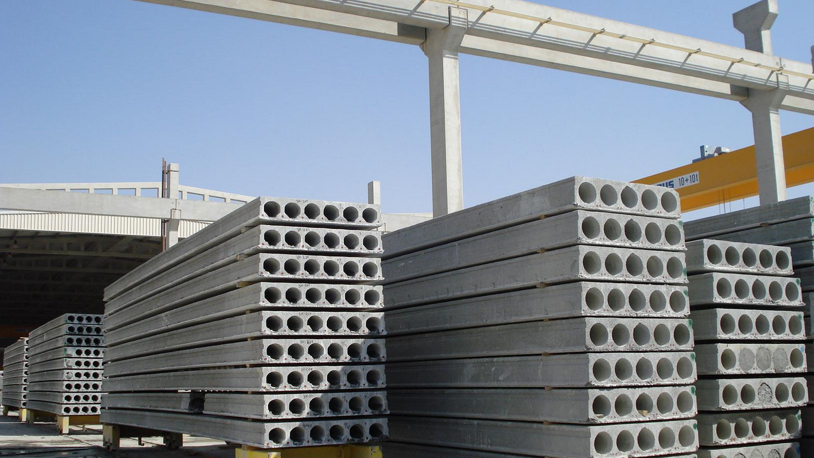 Stacks of hollowed precast conrete elements awaiting transportation