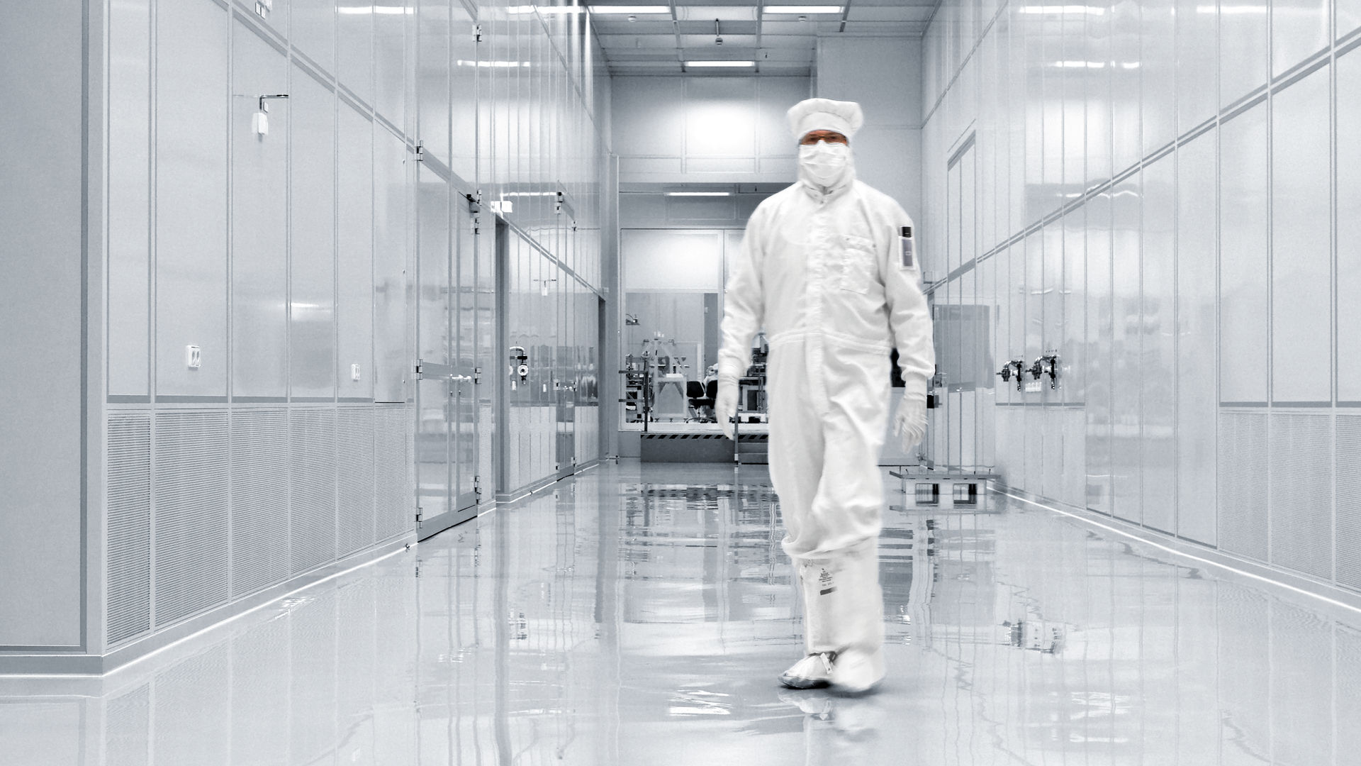 Man with mask on in clean sterile area sterile - iCure
