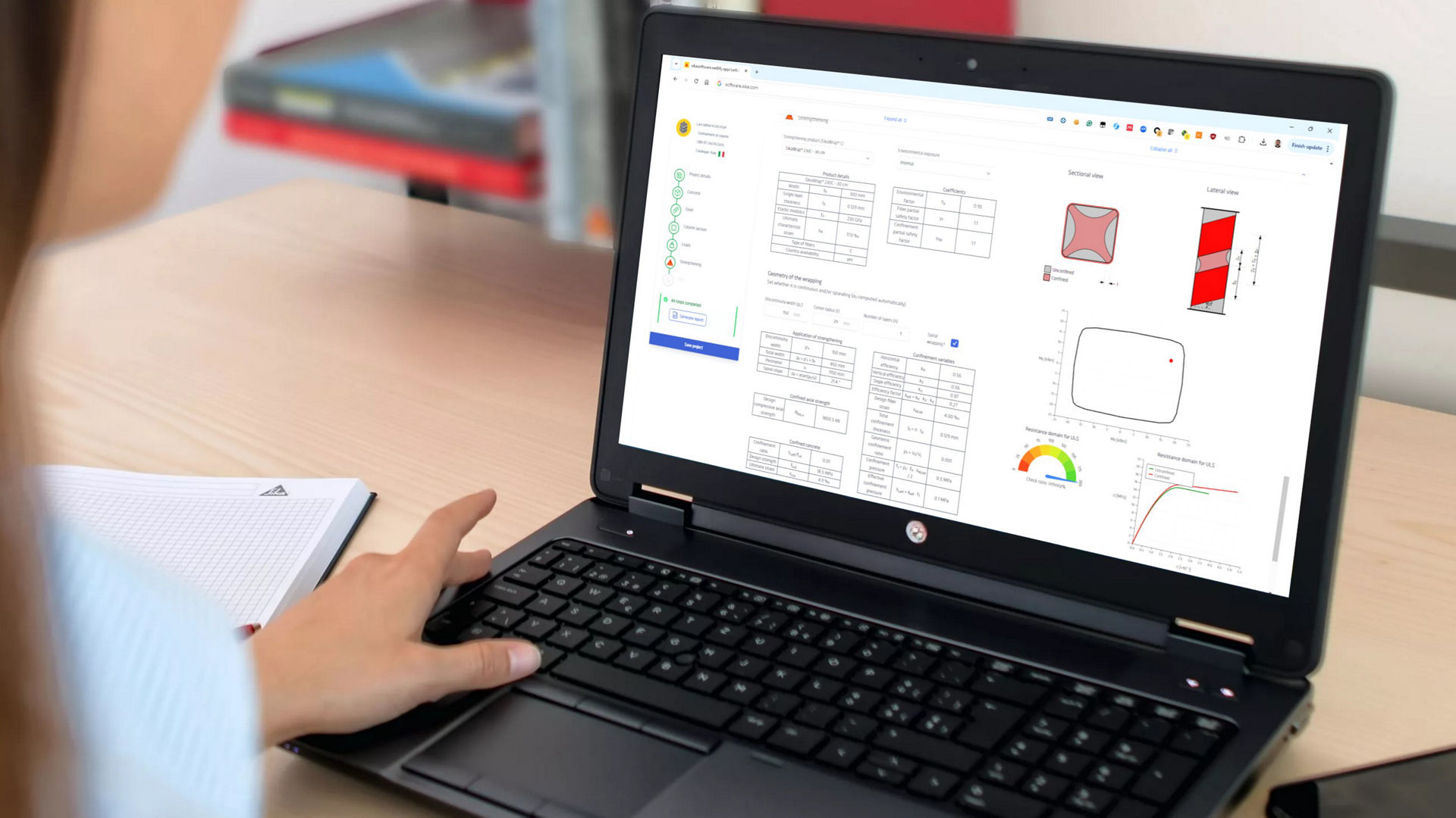 Woman engineer analyzing structural data on laptop screen with Sika CarboDur software tool