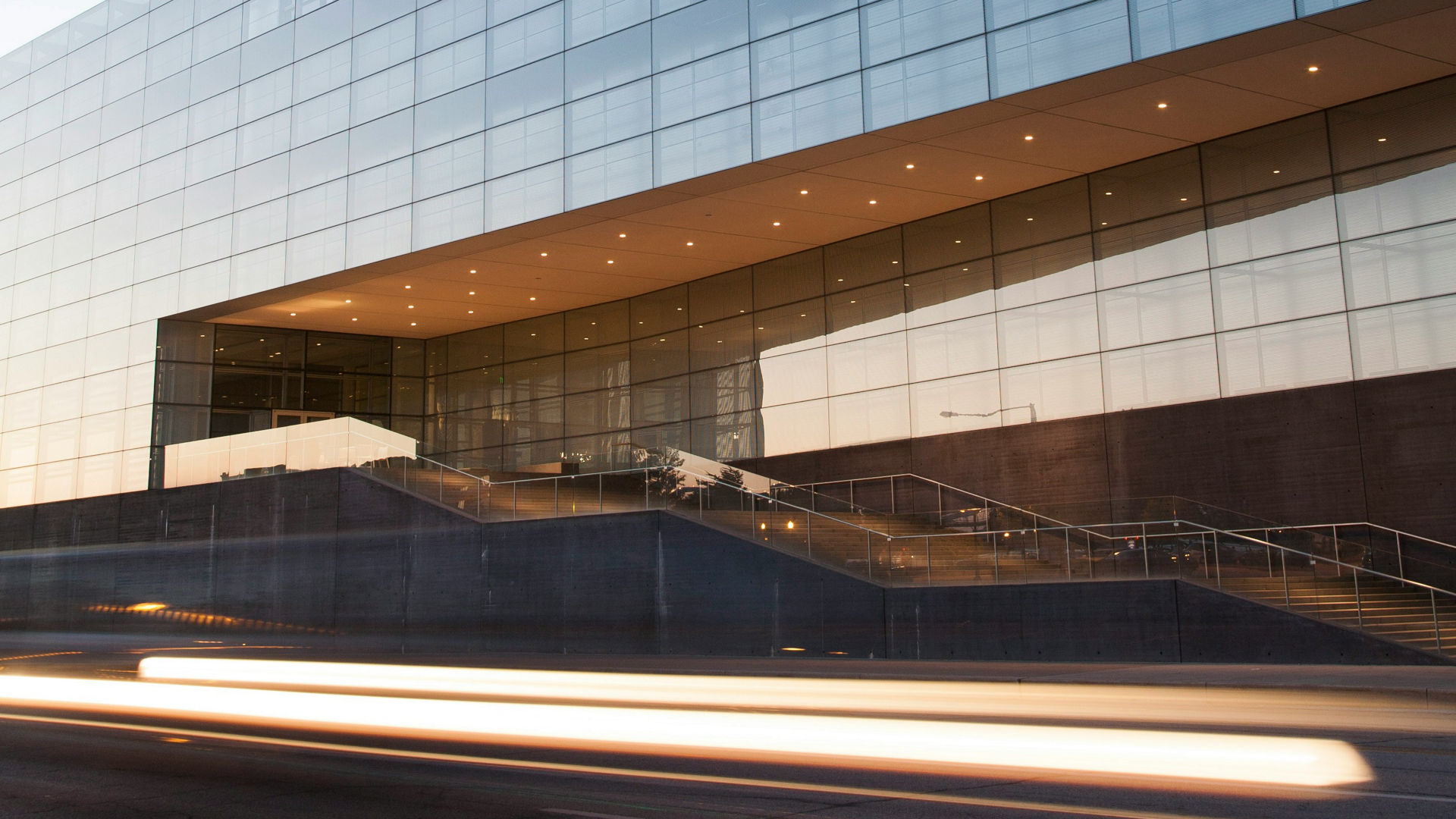 Modern glass building at dusk