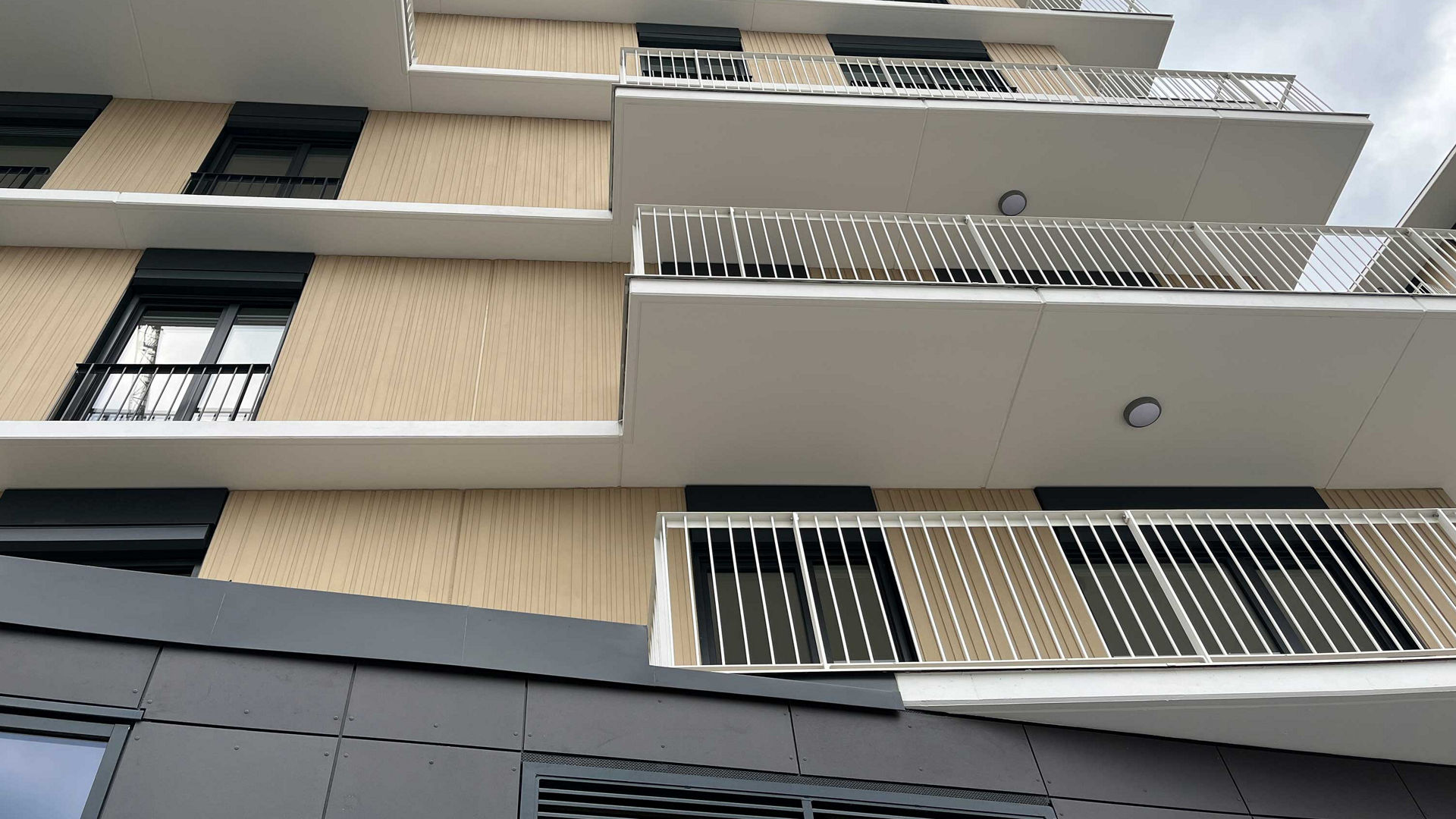 Modern apartment building with geometric balconies