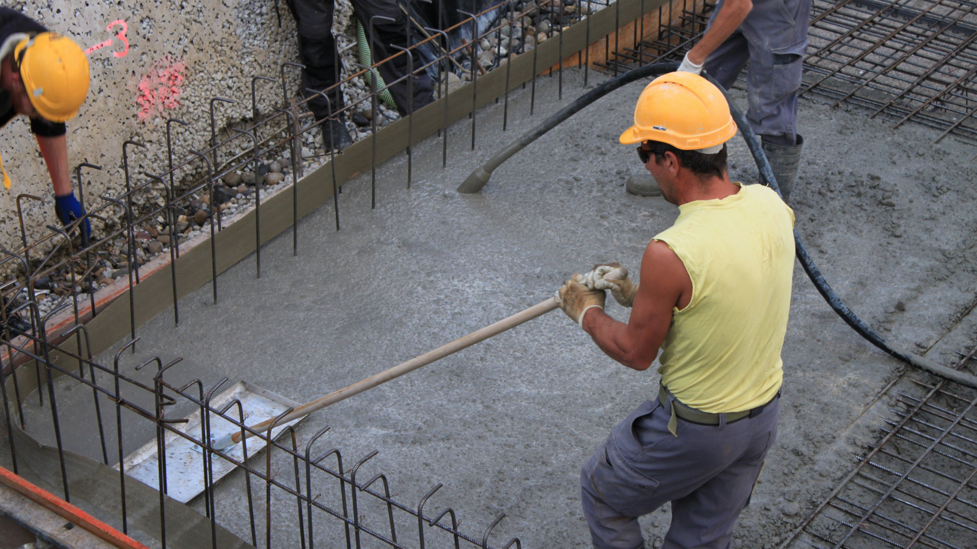 men applying waterproof joint sealing systems