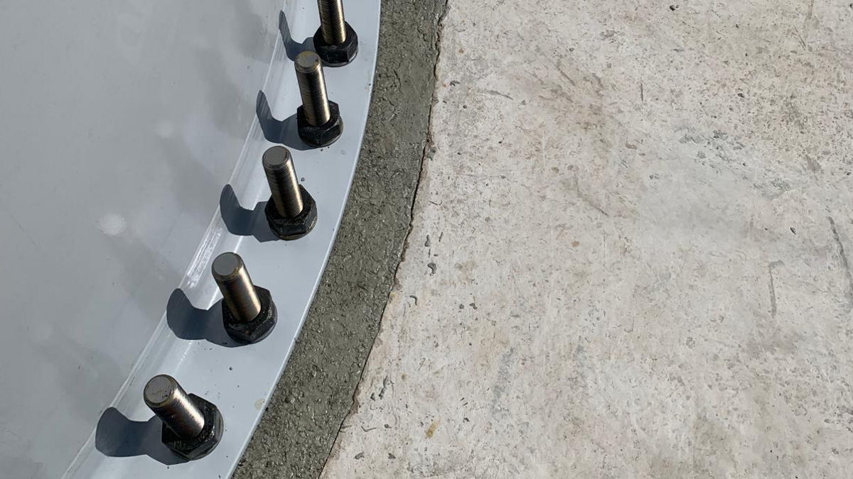 Industrial bolts on curved metal structure