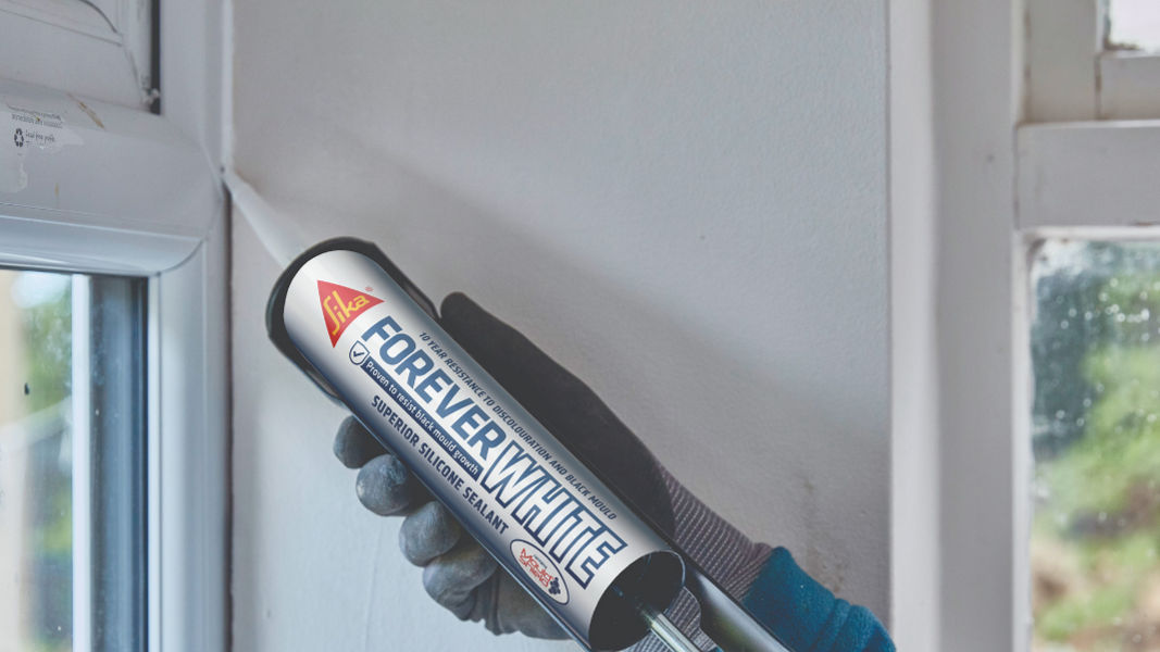 Sealant application near window frame