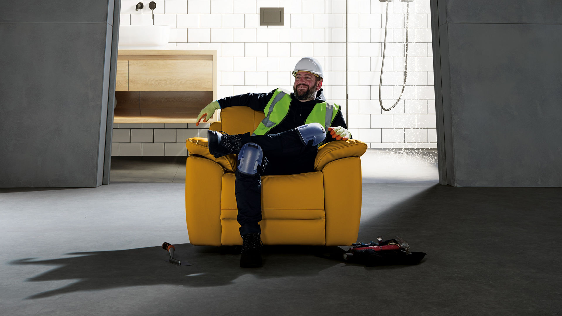 Person in yellow chair in modern interior