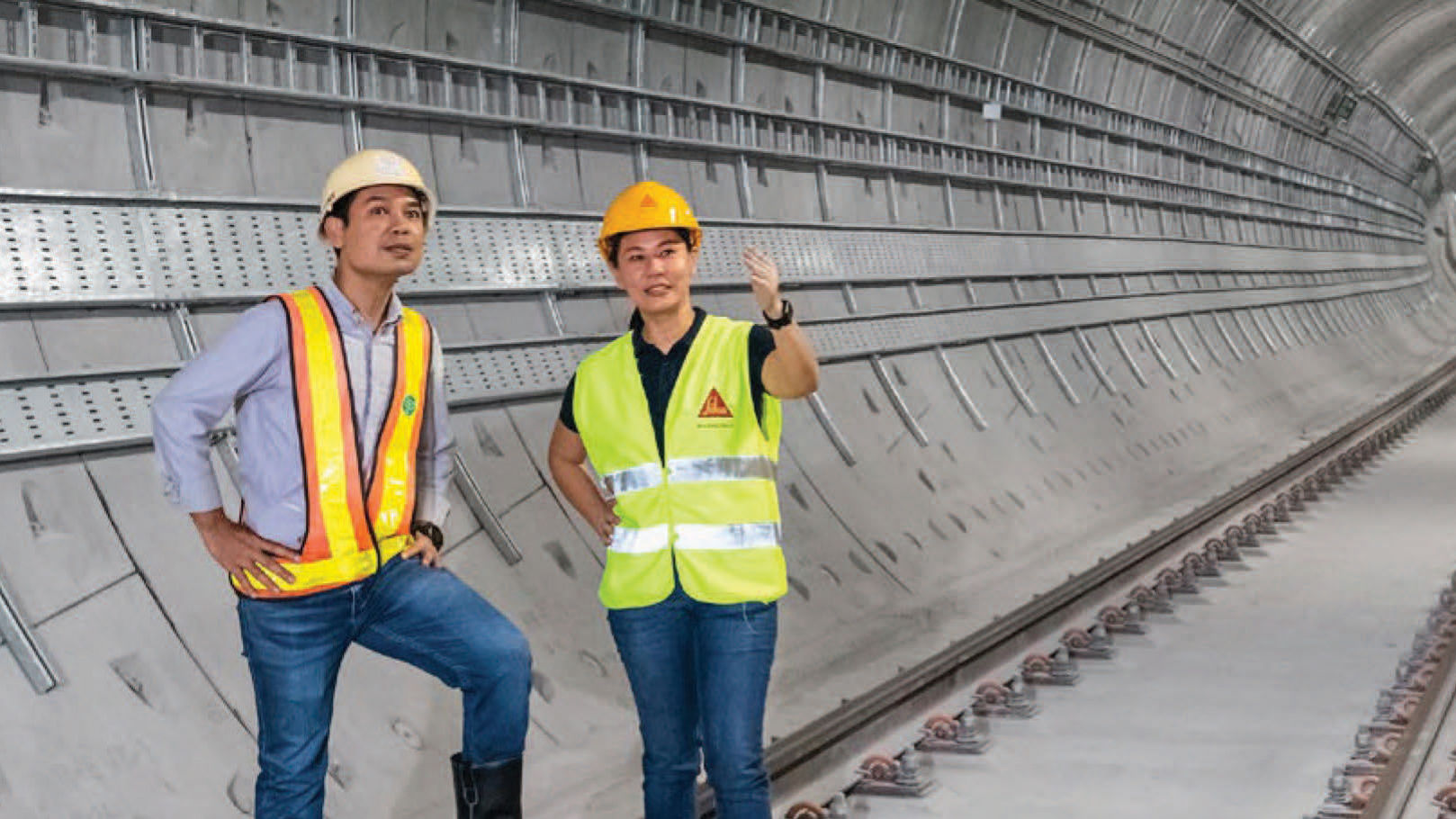 two wworkers in a tunnel